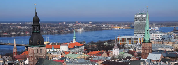 photo of a city skyline, river in background