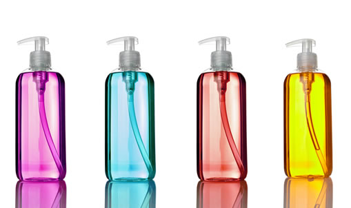 photo of colorful bottles for shampoo or soap