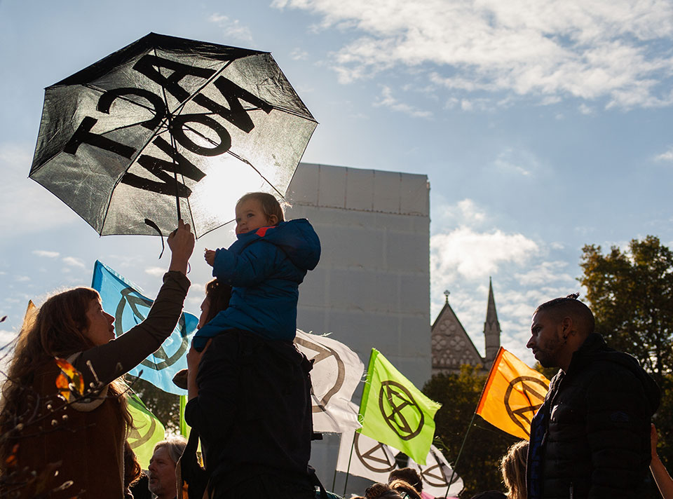 Oil and gas companies bring in profits of around $2.8 billion per day, a new study finds, underscoring the economic power that advocates for a clean-energy future are up against. Photo by Extinction Rebellion.