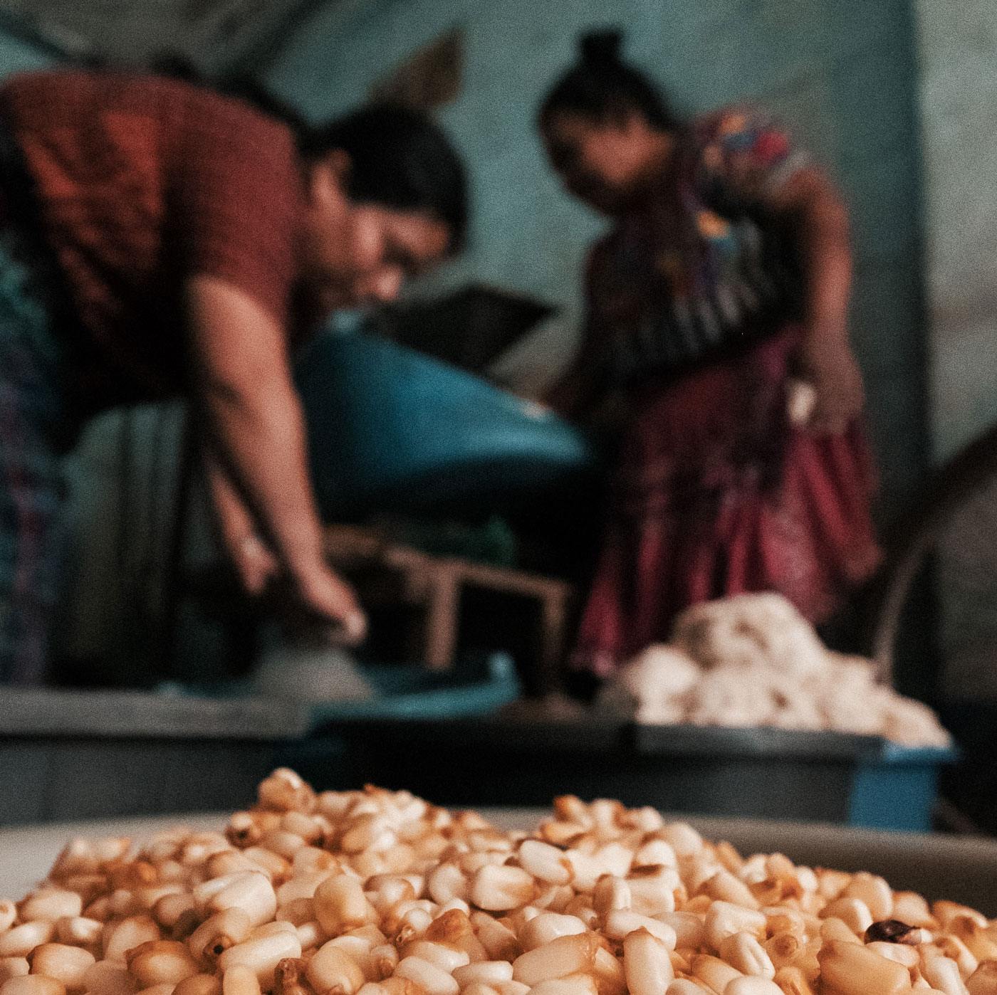 photo of women milling maize